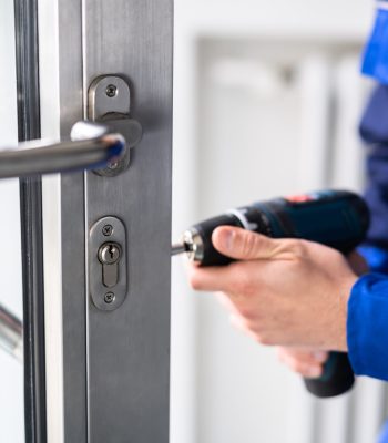 Locksmith,Man,Repairing,And,Changing,Metal,Door,Lock Locksmith,Man,Repairing,And,Changing,Metal,Door,Lock